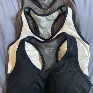 Bundle of 3 new sports bras great for nursing/ pregnancy! White, black and grey